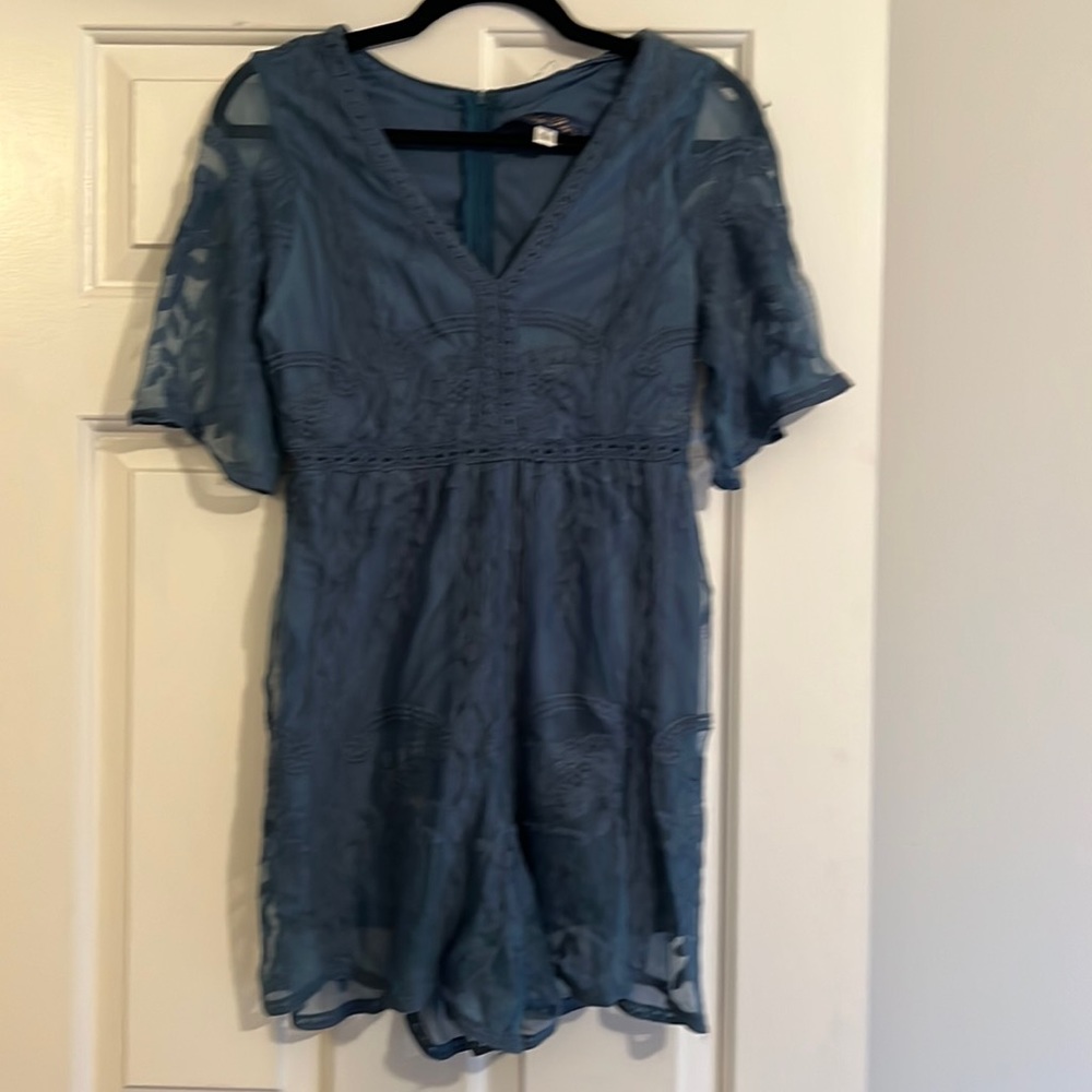 Ladies size small blue romper. Immaculate condition, only worn 3 times.